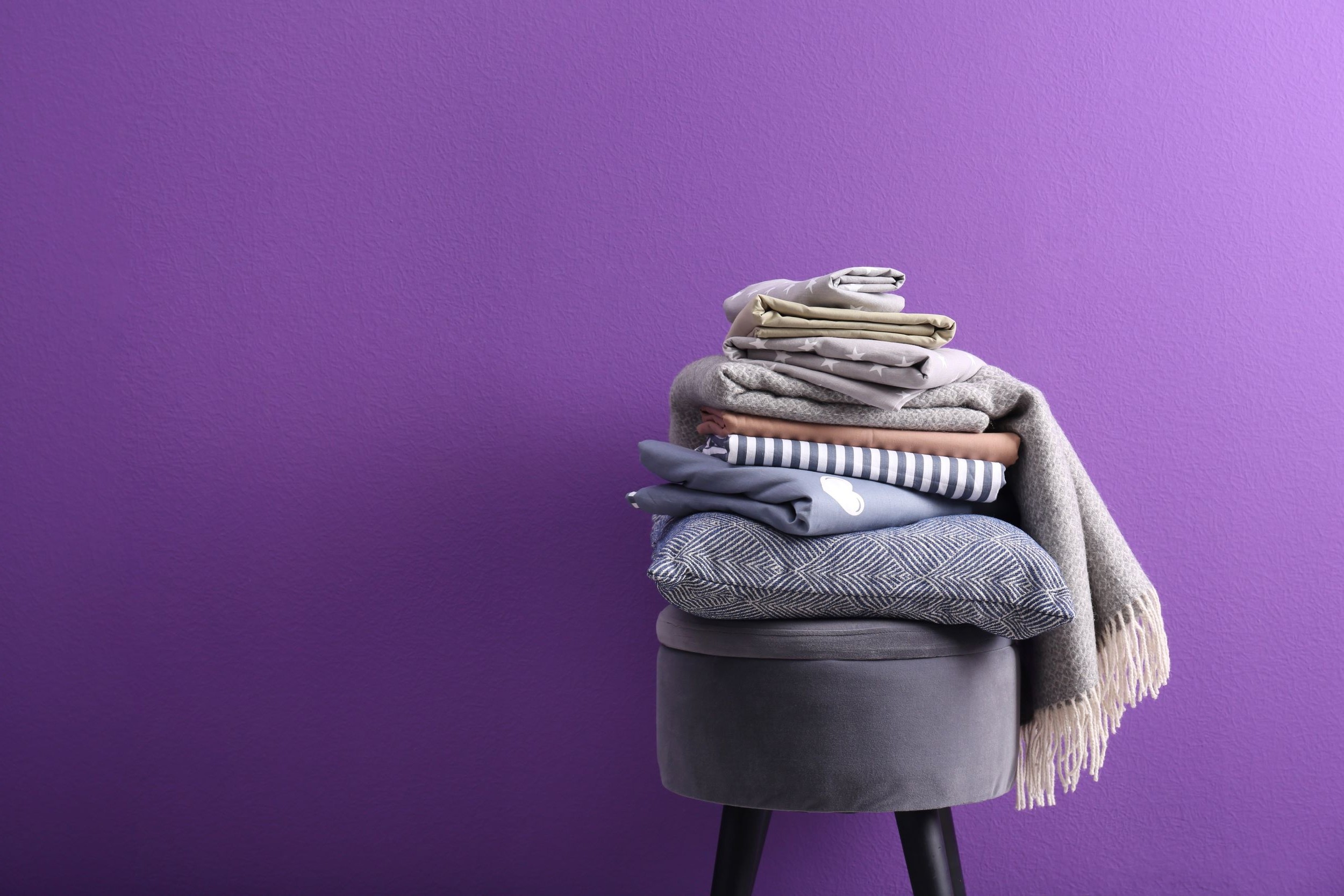 Purple Sheets Flipped Shutterstock 2542939811