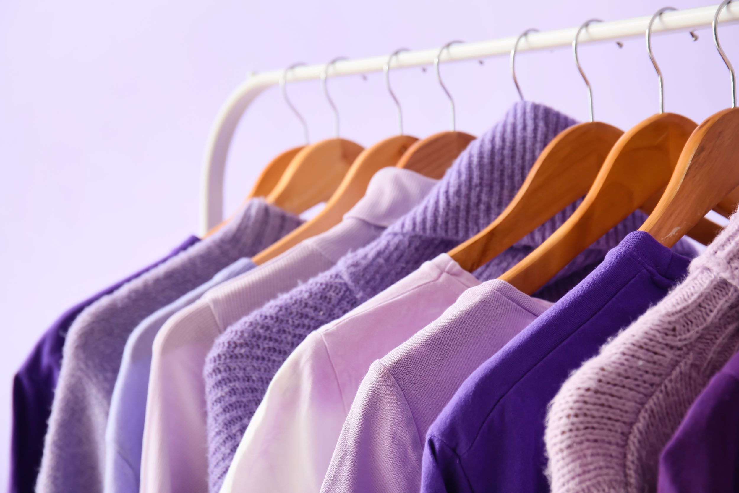 Purple Hanging Clothes Shutterstock 2150395491